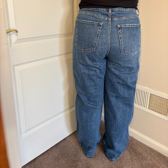 High-waisted, long, blue jeans with two holes on the knees - Picture 2 of 7